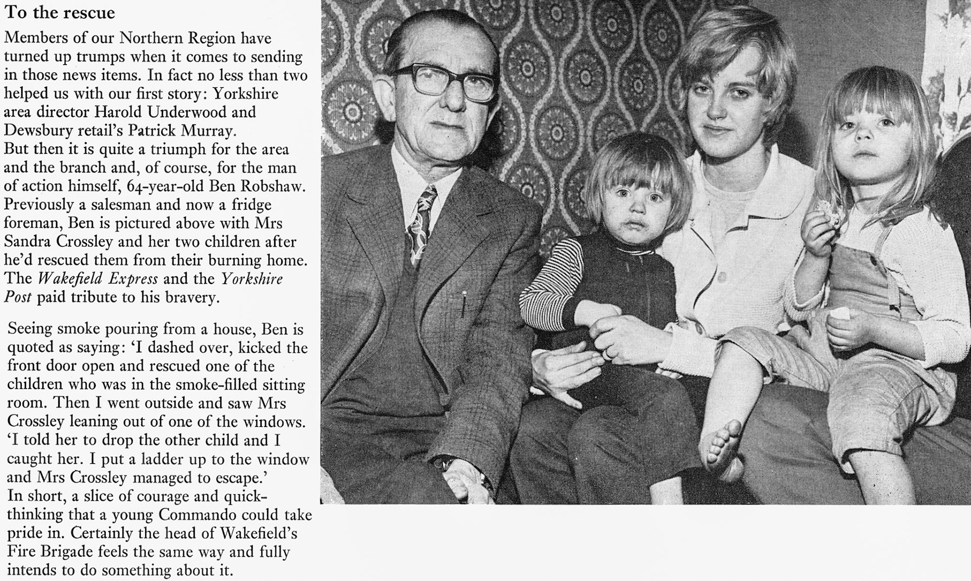 1973 Dewsbury foreman Ben Robshaw pictured with a family he rescued from their burning home. (Express News Spring)