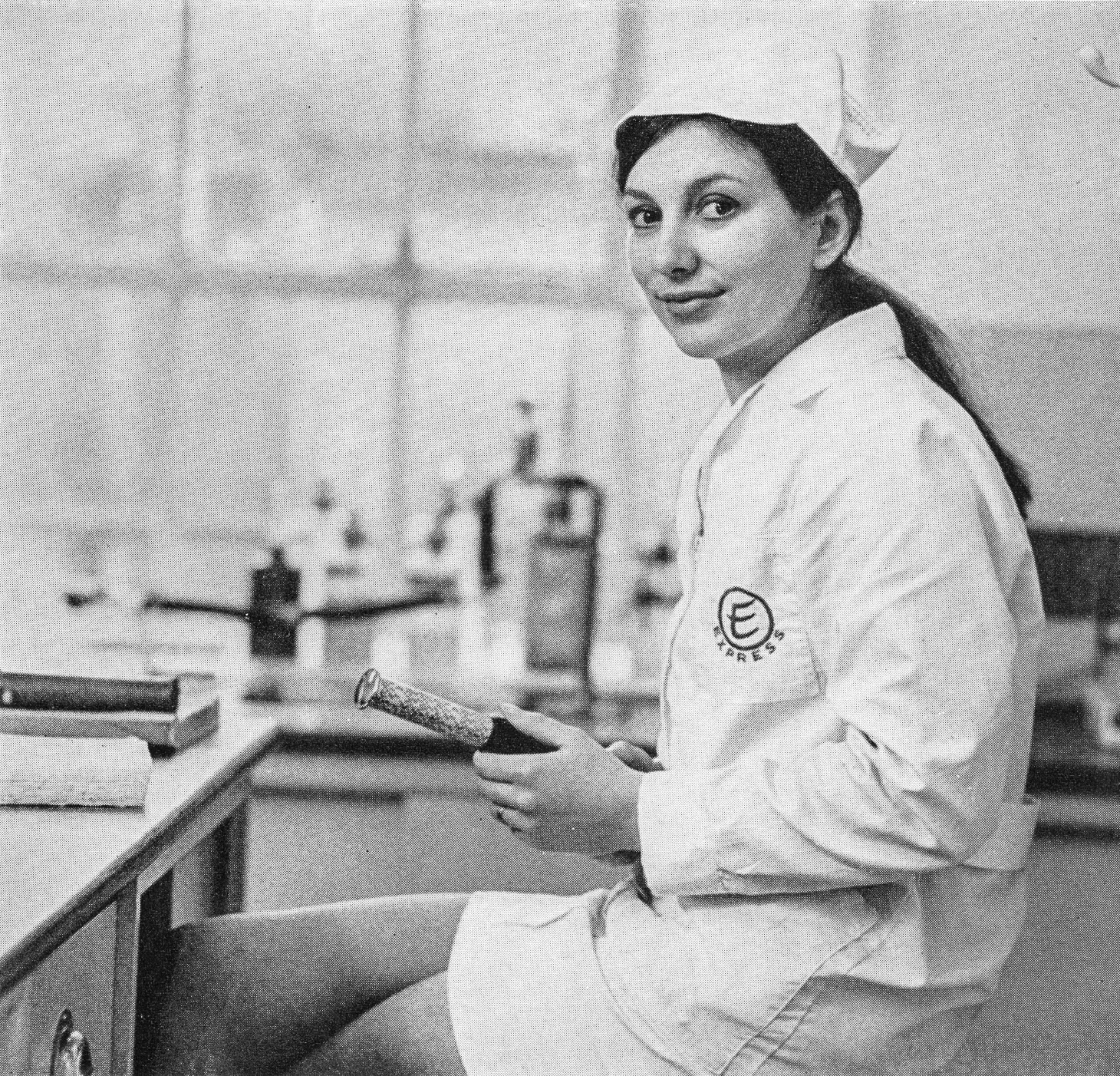 1971 Mrs Valerie Napper works out the moisture content of a cheese sample in the laboratory. (Express News Summer)