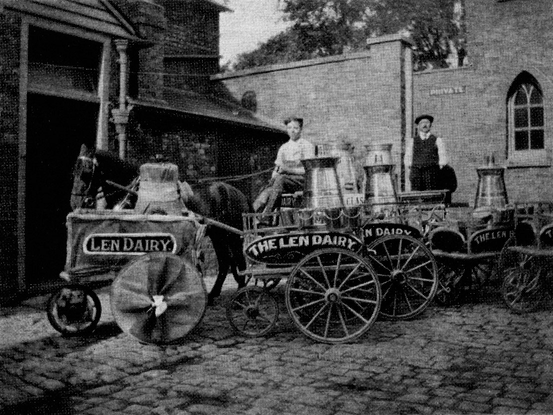 1920 at 'The Len Dairy', with Mr Jack Wickens grasping the reins, and his father, Mr Walter Wickens, standing resolutely in the background.  (Express News Summer/Autumn)