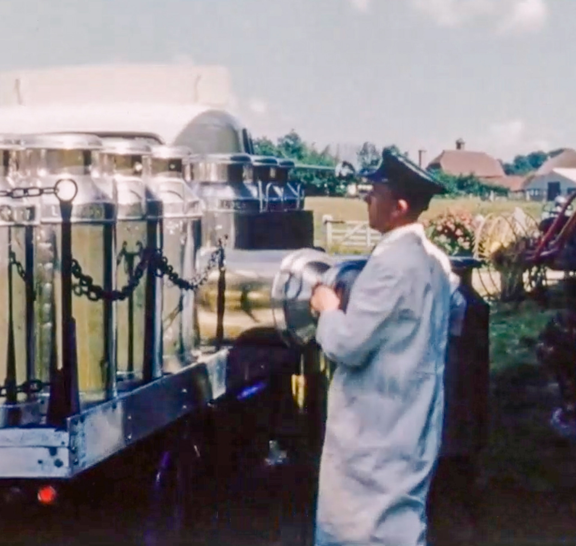 1954 Churn collection by PYD 961 from Garlands Farm, near Slinfold, for Billingshurst Creamery. Nick Thompson comments "My Dad-Sydney (Sid) Thompson" (Stills from Express Dairy Film)