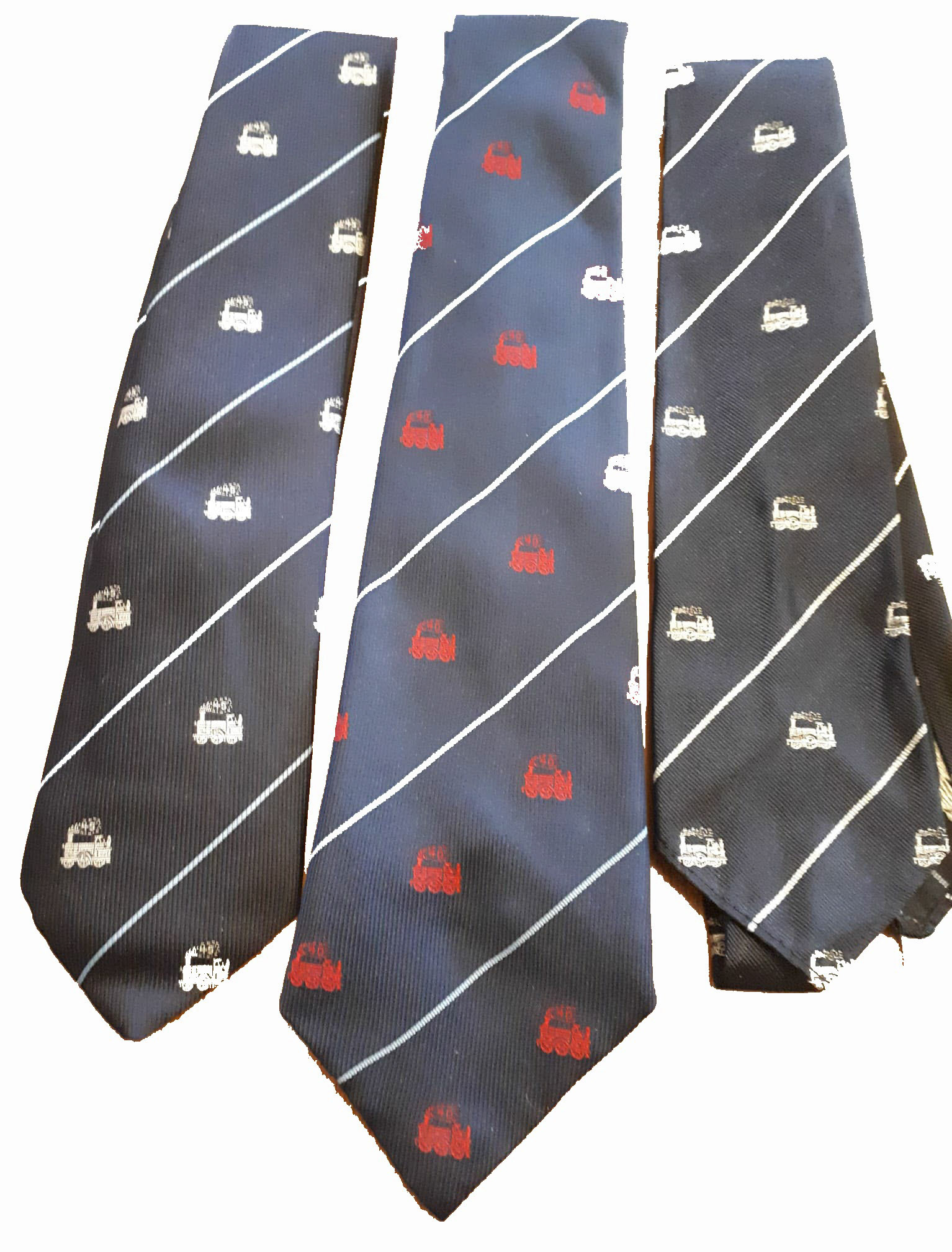 1991 Sid Marie, milkman at Northwood Depot retired after 50 years. Christine Kempster, his daughter, comments "Dad's long service awards-the red tie was 45 years I think. I spent many hours as a child polishing the silver cigarette box! I have all his long service awards...badges and ties with the little train motif, a silver cigarette box and my brother has a watch."