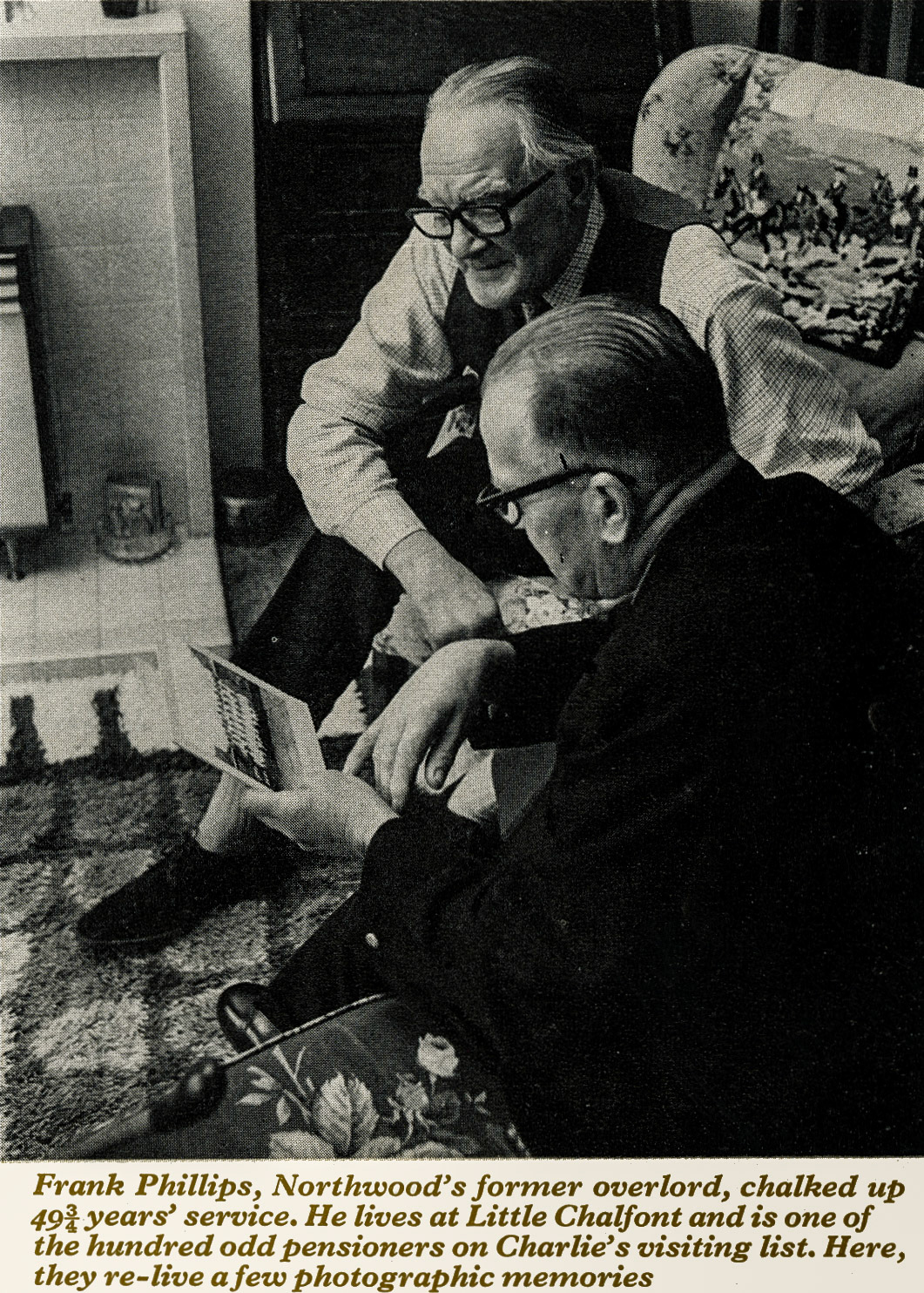 1975 Pensioner Frank Phillips, ex-manager of Northwood Depot, being visited by Charlie Adams. (Express News Spring)