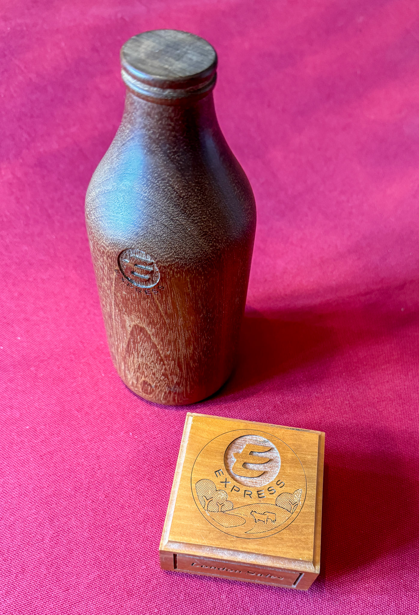2024 Beryl Purslove memorabilia-wooden 'pintie' bottle and paperweight. (Courtesy Beryl Purslove)