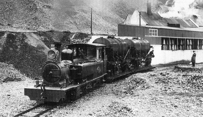 1930's Ecton Cheese Factory. Transporter wagons in use with main line milk tanks.