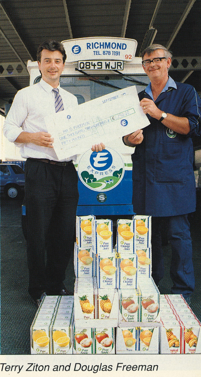 1989 Douglas Freeman from Richmond Depot receives an award from Richmond Manager Terry Ziton for reaching his fruit juice sales target.