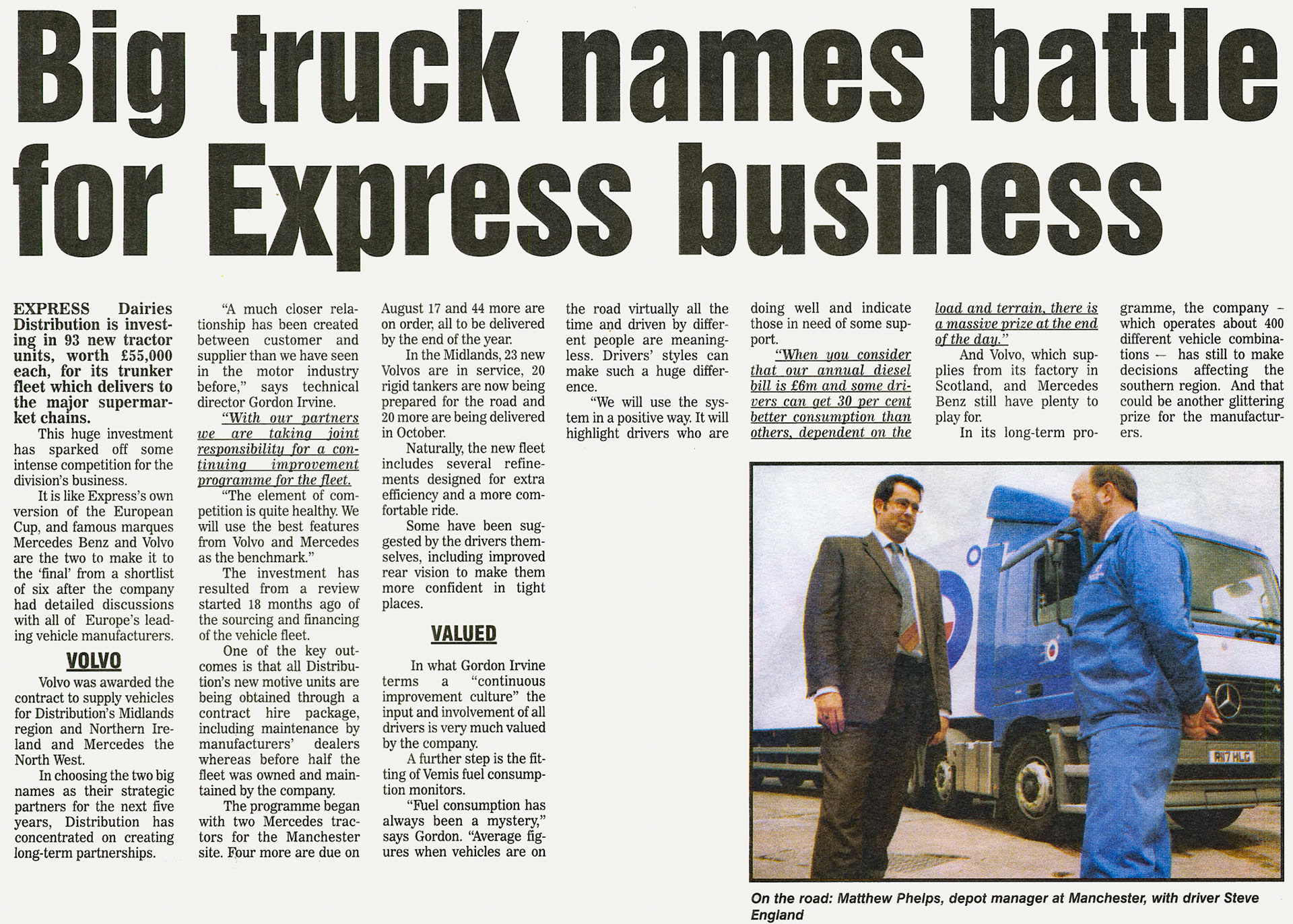 1998-Express Dairies Distribution review the performance of tractor units from Mercedes Benz and Volvo. Manchester Depot Manager Matthew Phelps is pictured with driver Steve England. (Courtesy August Express News, Mark Hudson)