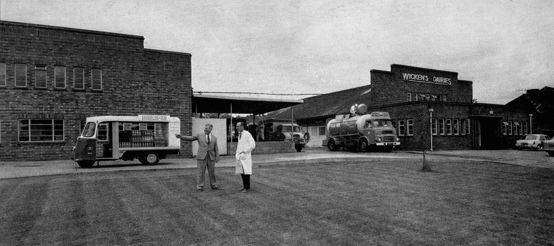1965 The spacious front of Wicken's Dairies, acquired by Primrose &amp; Len in 1961. The figures in the foreground belong to Manager Mr David Dawe and Dairy Foreman Mr Reg Smith. Frank Ward remembers that Primrose and Len also took over Griffins Dairy in Upper Fant Road, in the early 60's. (Express News Summer/Autumn)