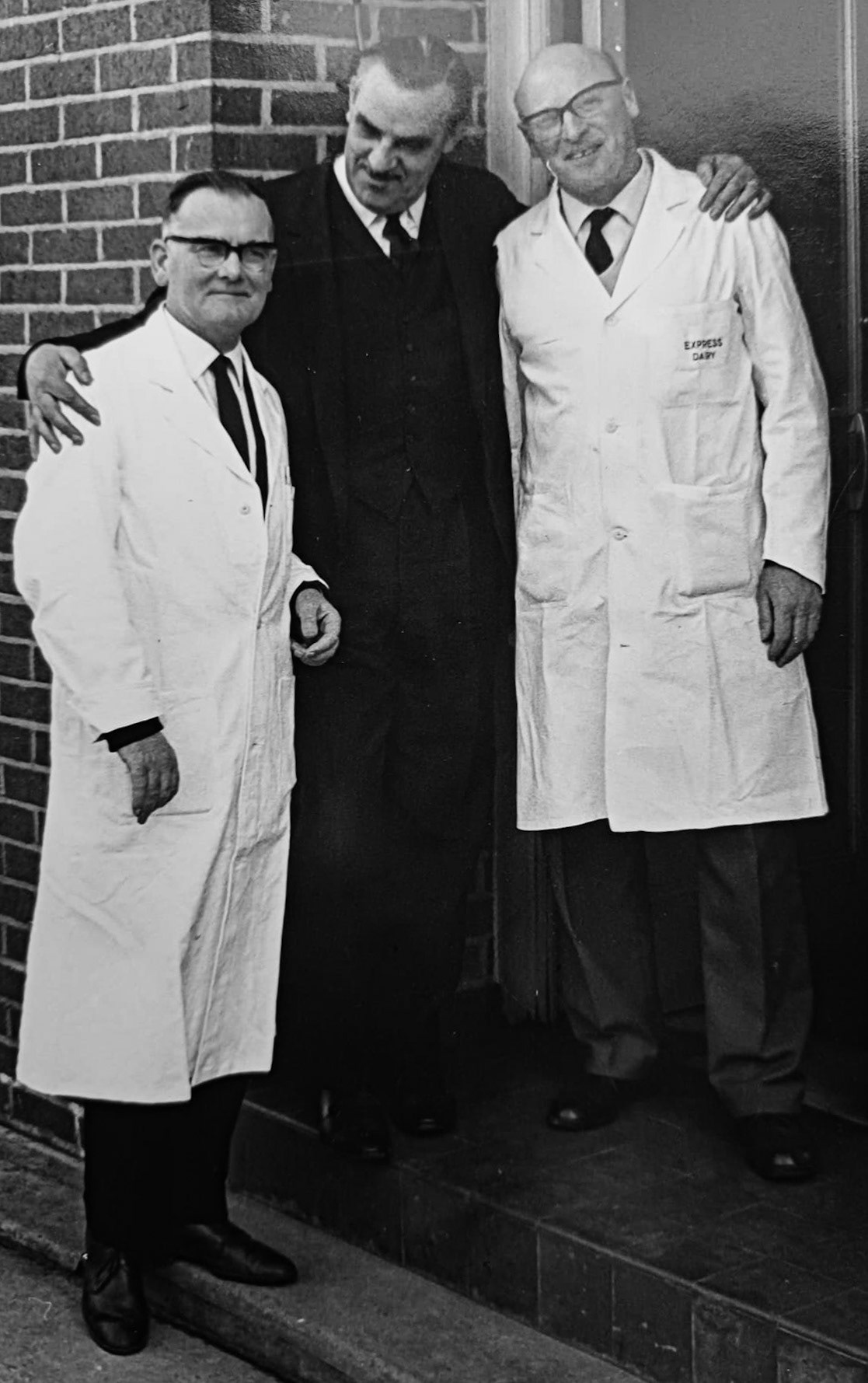 1969c Crediton. Phillip comments "Mr Hoxley on the left, with Reg Evans on the right. Franklin Engelmann in the dark suit, who presented the BBC programme 'Down Your Way'. Barry Thomas Parsons comments "Reg was one of our managers at Staplemead, a very nice man and a stalwart of our Social Club." (Courtesy Phillip Budd)
