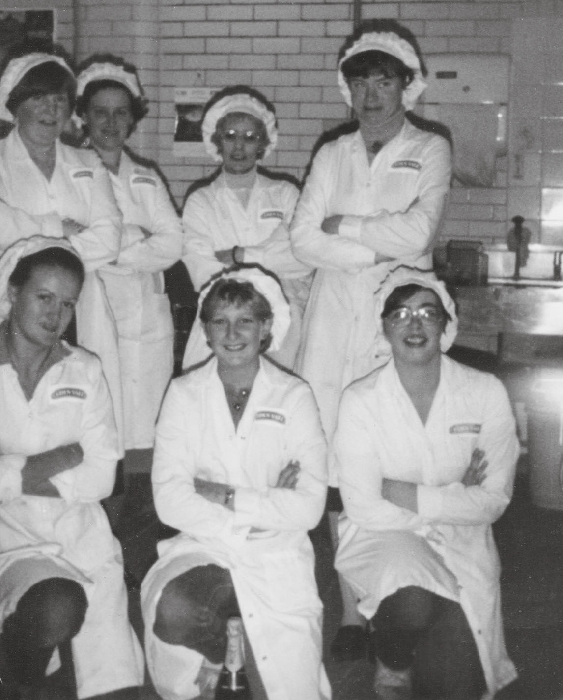 1979 Staplemead, "Inside the old micro lab". Kate Morrison comments "Bacti lab girls-back row Hazel,Josie, Nora, Jo. Front row me (Kate Morrison), Heather, Janet Millard, who adds "I worked there 42 years retiring in 2021. I have been working back there for 2 days a week in the winter to help out. It's now a French owned dessert factory."" (Courtesy Frank Dineen, married to Hazel, top left)