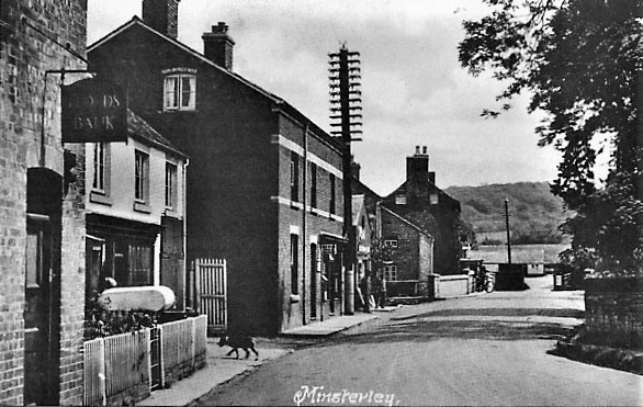 1932 Minsterley postcard franked 3rd November 1932. "A dog has just crossed the road, there's what looks like a tin bath on the wall, and just look at the telegraph poles!" . (Courtesy Colin Middleton,Shropshire Star)