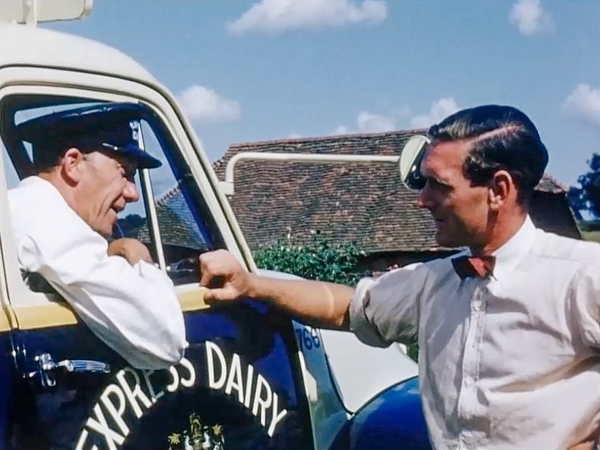 1954 Churn collection by PYD 961 from Garlands Farm, near Slinfold, for Billingshurst Creamery. Nick Thompson comments "My Dad-Sydney (Sid) Thompson" (Stills from Express Dairy Film)