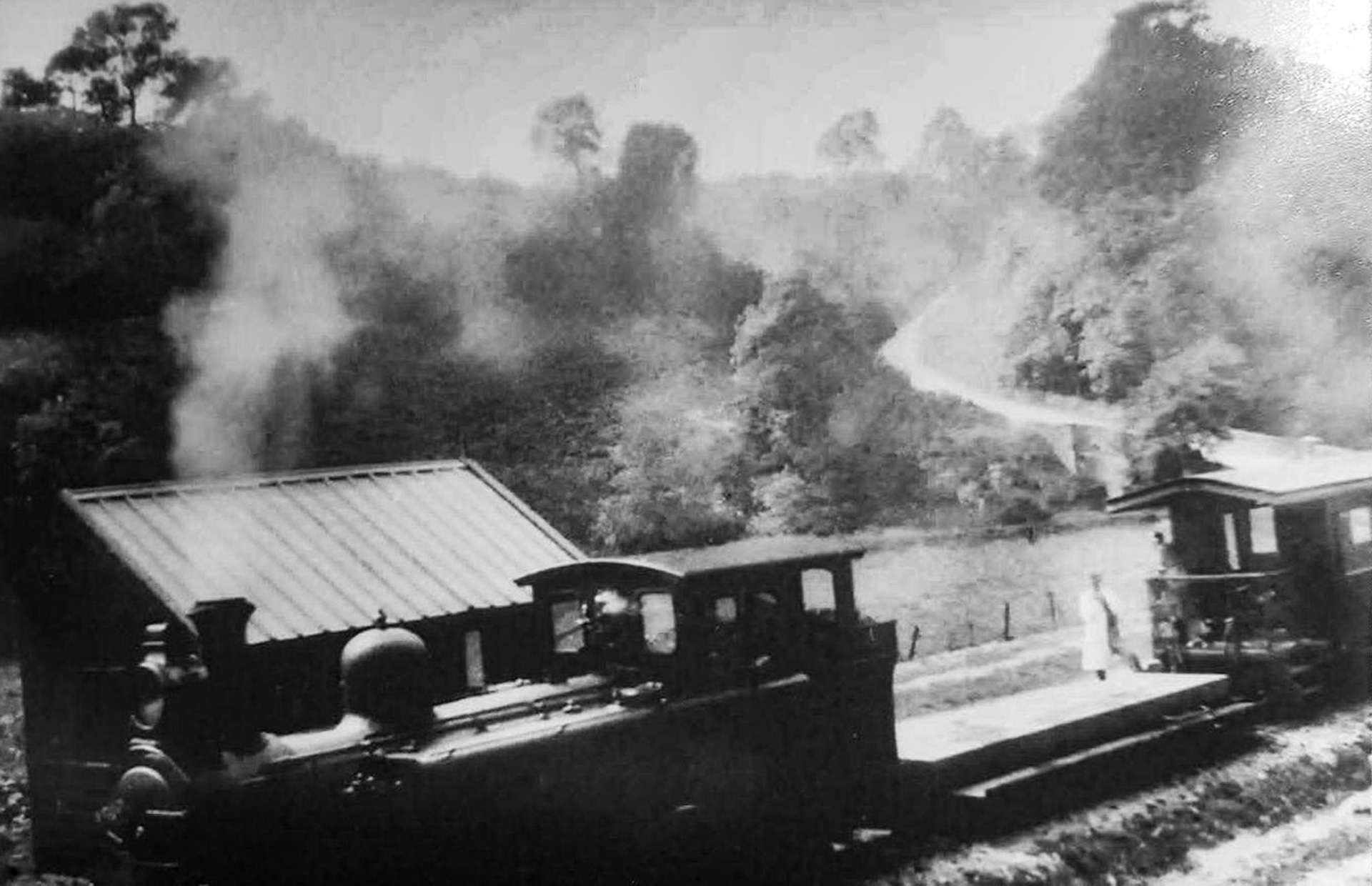 1930s Ecton station with the engine about to shunt the creamery siding. John Irish comments "The creamery manager, Mr Dainton is next to the transporter wagon." (Courtesy John Irish, Butterton- A Doubly Thankful Village FB Group)