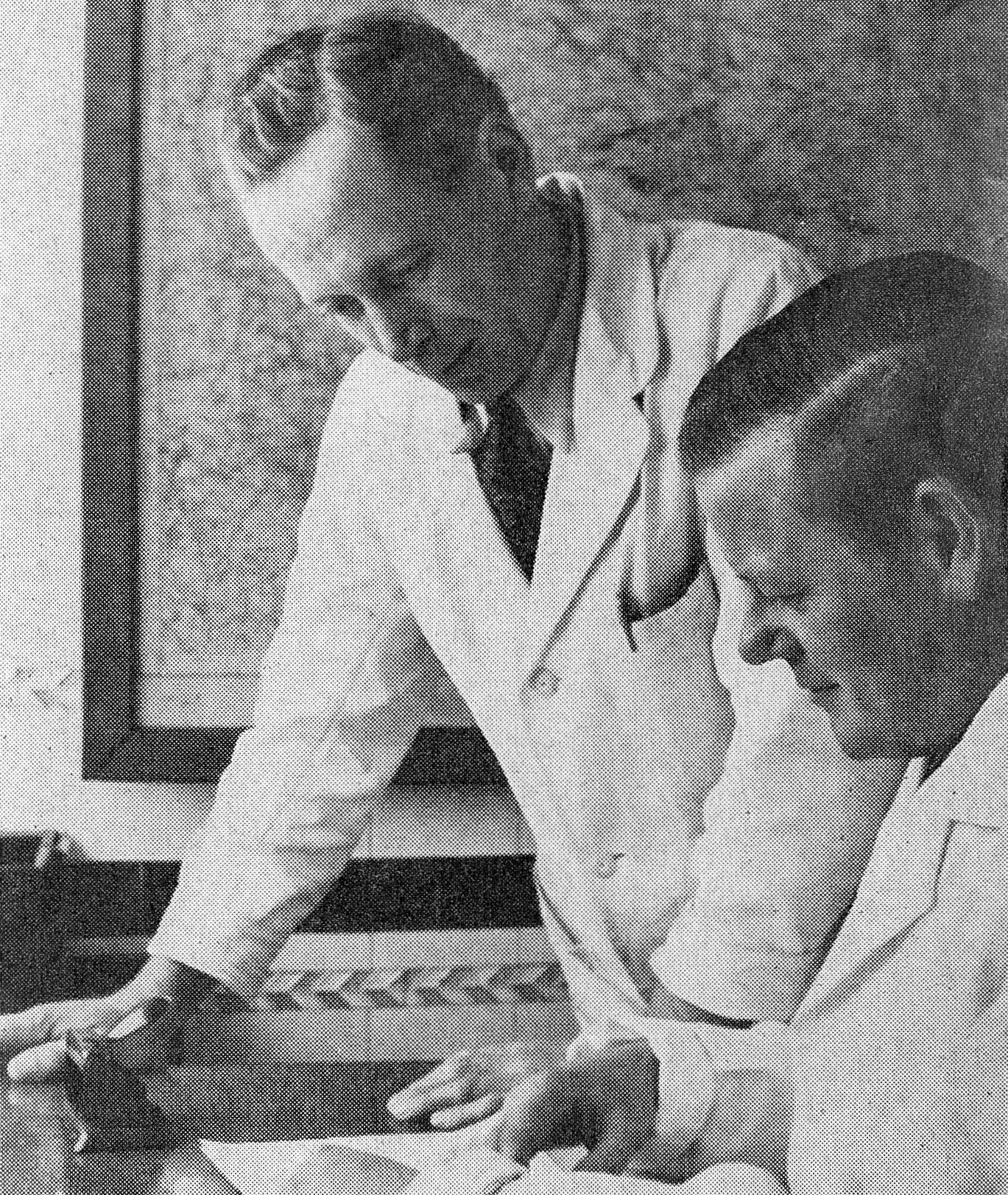 1956 Rowsley Creamery. Dairy Foreman Bob Carline studies the holiday rota with Manager David Allsop. (Express News April)