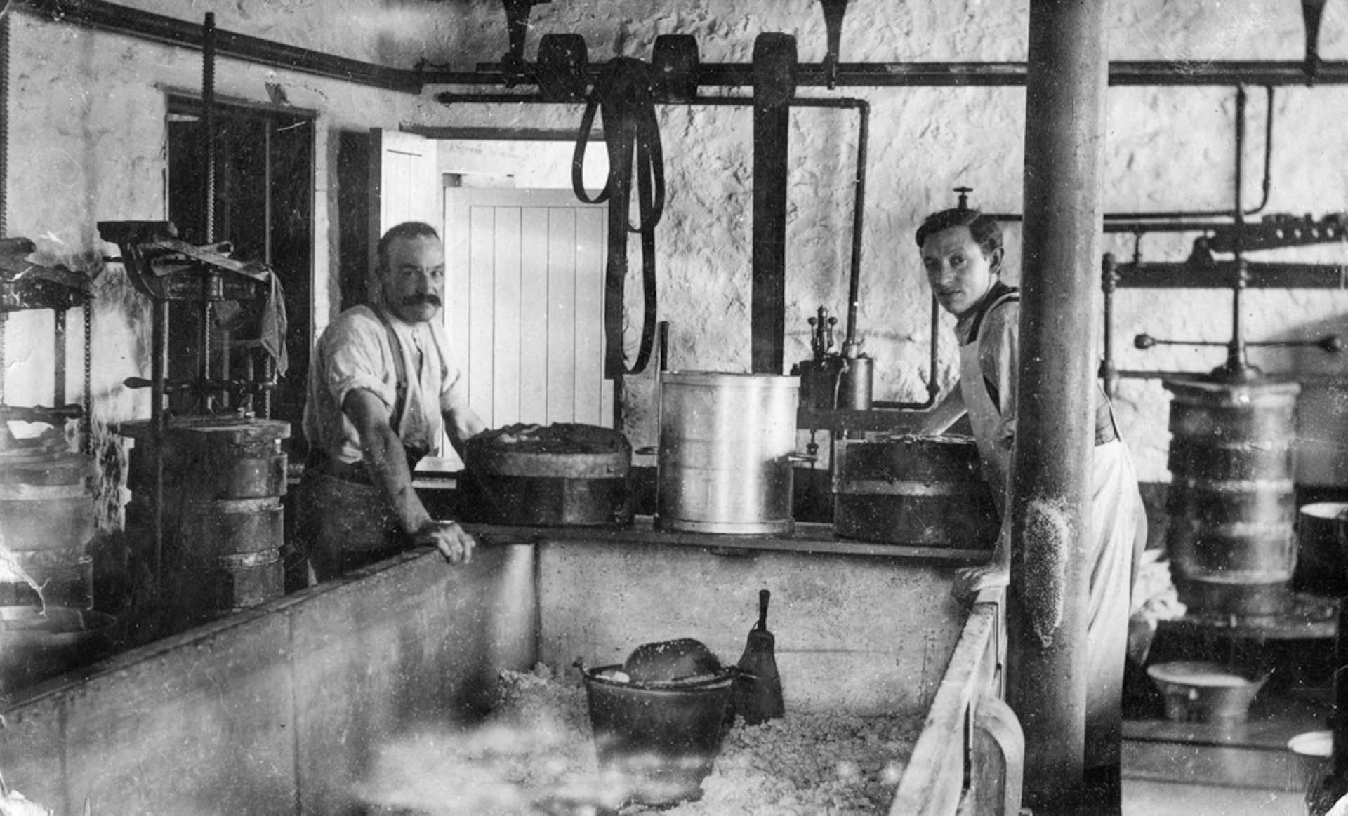 1920 Reapsmoor Dairy. Alan Salt comments "Mr Sutton and Mr Woolley cheesemaking-not sure who owned the Dairy in 1920 but the site did become an Express site later". (Courtesy Alan Salt)