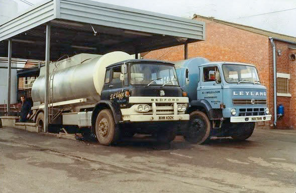 1976 Ruyton before the new unloading bay was built. Gerald Mills comments "This Bedford KM was returned to Thompsons to be reclad after it rolled over at a farm near Llanrhaeadr ym Mochnant in 1974. The vessel was later remounted on a T reg. KM and later still, remounted and increased in size to 9700 litres, on an A reg. Dodge Commando. The Leyland Clydesdale was my own vehicle, new in 1975." Steven Harley "Barry Clarke and Gerald Mills were the drivers of these tankers".  (Courtesy Gerald Mills)