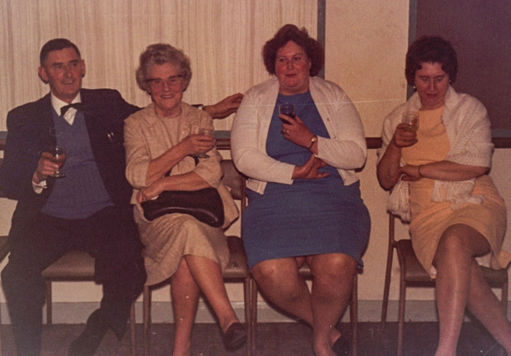 Alec Liz Williams identifies Joyce and Jim Pickering, Ivy Abbey. Other lady in glasses could be Doreen Williams. Malcolm Williams adds "That's my mother, 2nd from left". Sara Pickering confirms Jim Pickering and his wife Joyce Pickering, in the blue dress. (Joe Lyons Collection)
