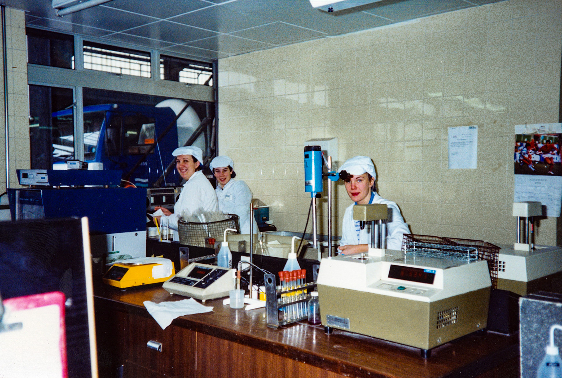 1991 Honiton, November, following closure announcement: Peta Wakeham, Sheila Webber and Vicky Maynard on milk testing. (Courtesy Wendy Hawker)