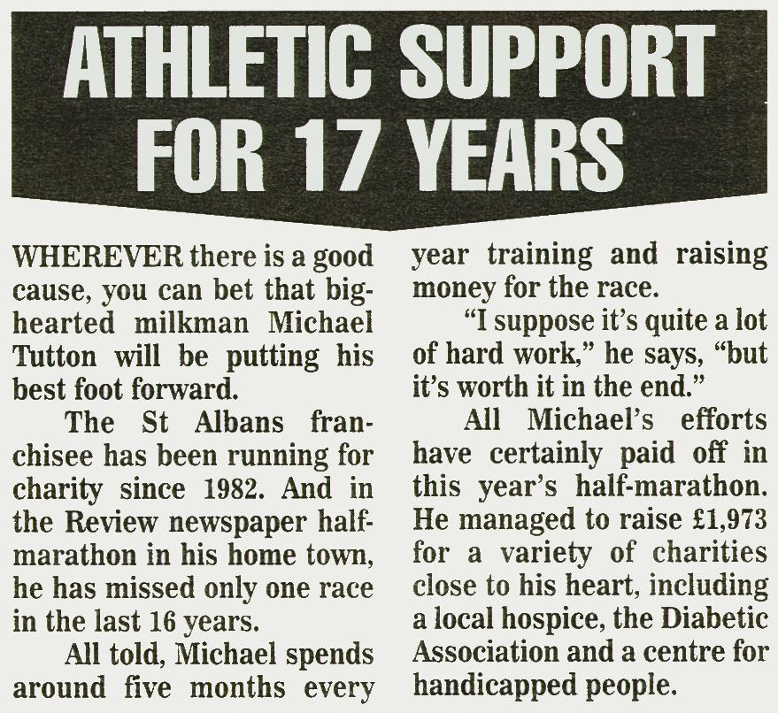1998-St Albans-Express Dairies franchise milkman Michael Tutton running for charity. (Courtesy August Express News, Mark Hudson)