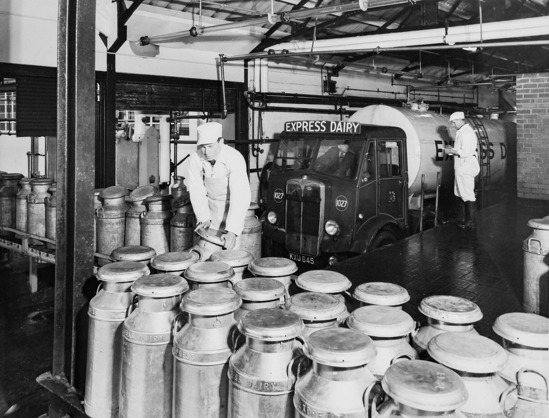 1950's Rowsley Dairy churn bank/ tanker bay, with tanker 1027, Reg: KXU 845. (Courtesy Derbyshire Record Office, donated in March 1985; they had previously belonged to the donor's father, who was an electrical engineer with the dairy.)