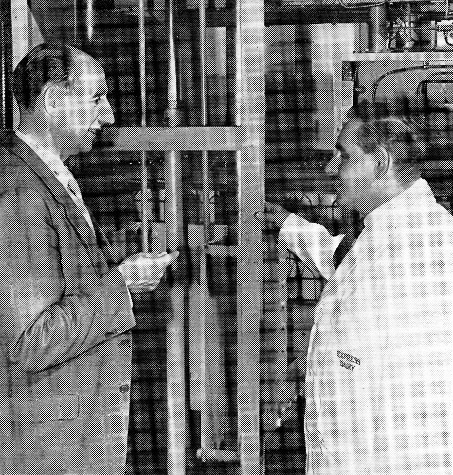 1958 Wakefield Dairy opens. Mr C. P. Lamont, Director of Express Dairy Northern, who supervised the design and layout of the centre talks to Development Engineer Mr Bill Shires. (Express News December)