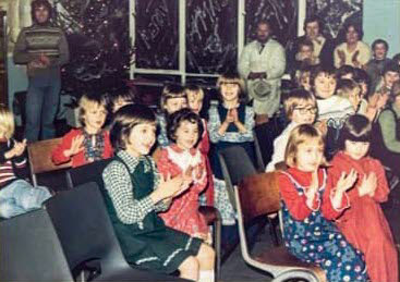 1980 Wendy Haywood, in the front row in the blue dress, with flowers on. (Courtesy Wendy Haywood)