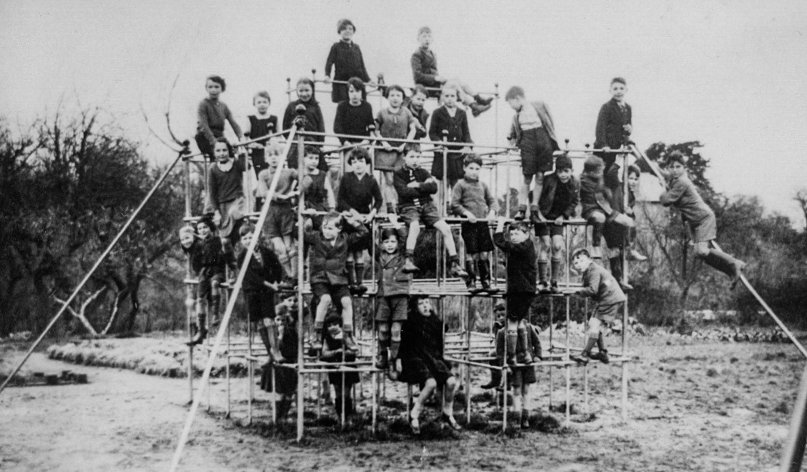 There is some doubt as to where this picture was taken. Jayne Rowson comments "This is definitely very similar to the jungle gym that we had at Minsterley, I fell off it too many times to forget. It could be Minsterley, photographed from the road side with the school to the left but it’s before my time. Great pic." (Courtesy Joe Lyons)