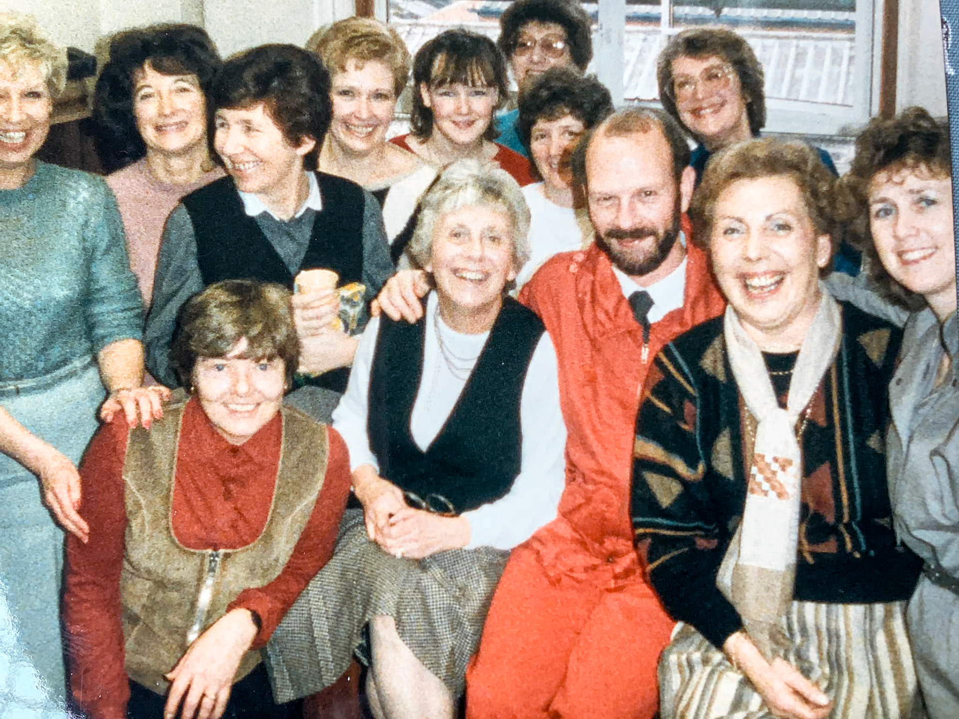 1980's Maureen Keating comments "Mr Kirby’s Group Block L-Front row: Rita, Norah Buckle, John Davies, Beryl Purslove, Pauline Grant. Standing: Ann Garrard, Maureen Keating, Molly Andoe, Pat Dickens, ? Molly Bendon, Eileen &amp; Carol Green (Courtesy Maureen Keating)