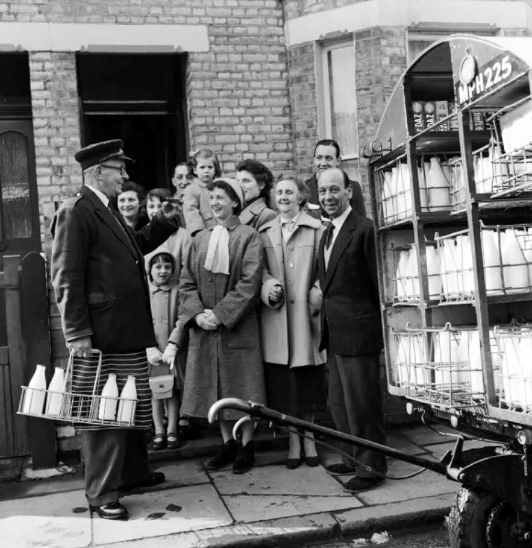 1958 Hornby &amp; Clarke. "Milkman Alfred Dobbs says goodbye to all his customers-Alfred is 65 years of age and is retiring after 48 years with Hornby and Clarke Ltd, Richmond. Three generations in one family have had milk delivered by him, and they all came to their mothers house to give Mr Dobbs a cheery send off on 9th March 1958" (Courtesy memorylane.co.uk)