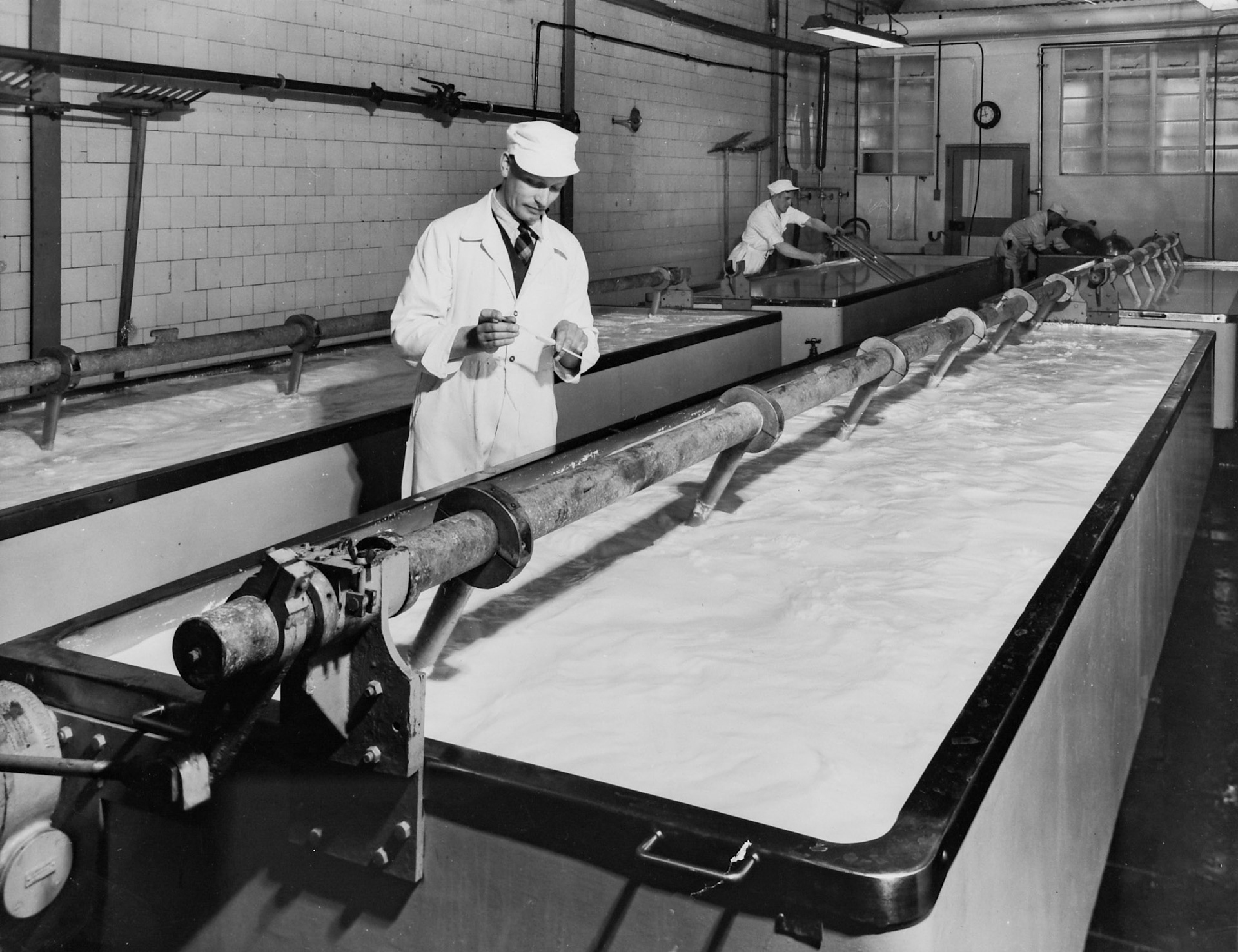 1950's Rowsley Dairy Cheese Vat Room. (Courtesy Derbyshire Record Office, donated in March 1985; they had previously belonged to the donor's father, who was an electrical engineer with the dairy.)