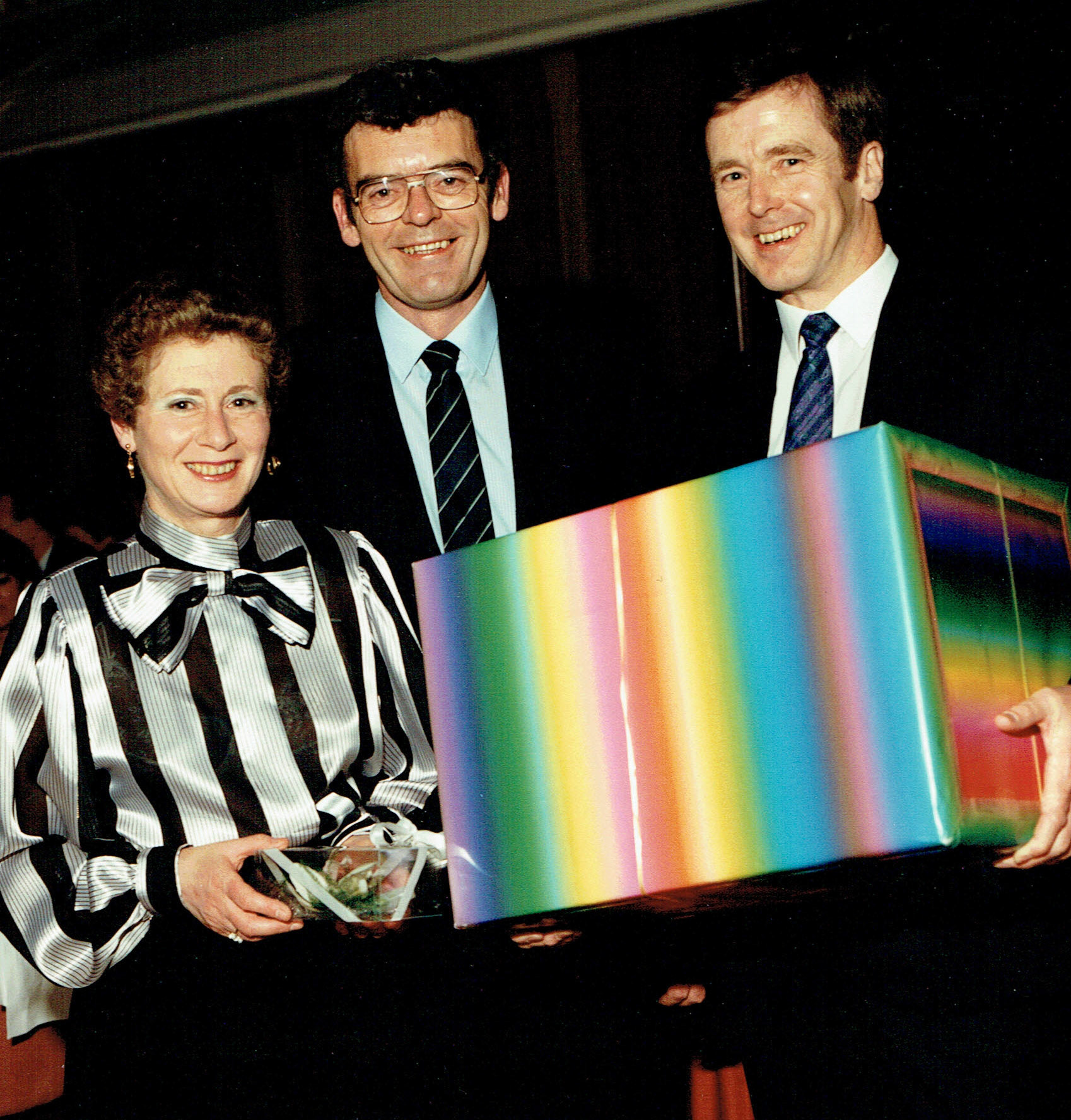 1989 DENNIS WATSON, PETER CHAPMAN (20 Year Long Service awards, with Peter and Jackie Chapman with Dennis Watson (centre) doing the presentation.(Picture courtesy of Peter Chapman)