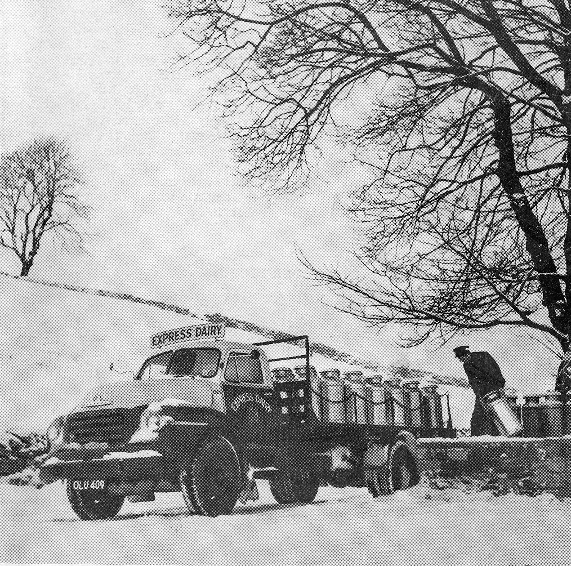 1956 Joe Dakin at a Peak District churn stand in the snow OLU 409, Co: 1525. (Express News Front Cover, April)