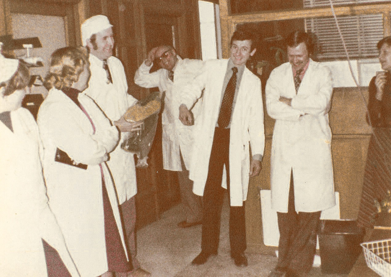1980 Staplemead, Frank Dineen comments "Technical Manager Ian Gibson leaves to take up a new job back in his home nation of Ireland. He was presented with a pair of wellies to help him in the bogs. When I can remember all the names will update. John Holland is to the right, looking down laughing. First left is Hazel Phillips (Dineen) and site receptionist Joan Alder." (Courtesy Frank Dineen)