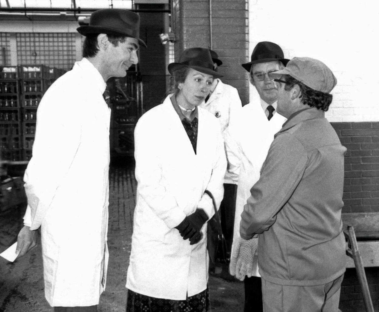 Princess Anne speaks with one of the fork lift drivers