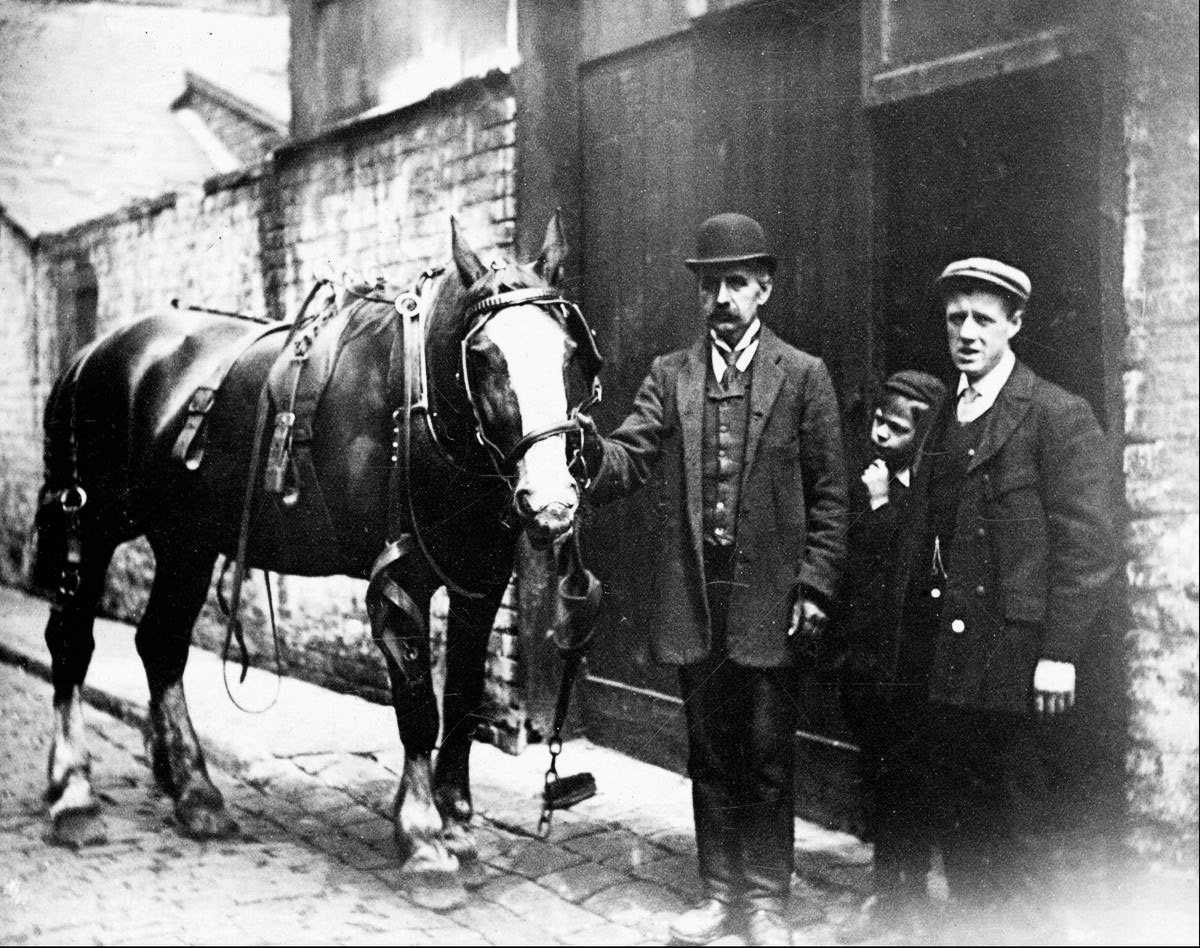 1920 Burgess Creamery, Horse and grooms (Image courtesy of Manchester Libraries)