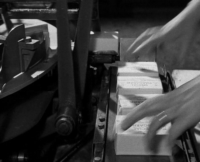 1940's Tower Creameries, later Mitcham Foods, part of Express. Packing. (Courtesy British Instructional Films, British Pathé)