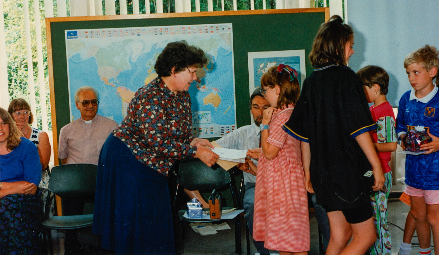 1994 Minsterley School Prizegiving. Maxine Scott comments "Kate Poole, can just see you on the edge of the picture". Several people identify Miss Onions as the teacher. Jo Swain Elmes comments "Raymond Smith, such a lovely man". (Courtesy Joe Lyons)