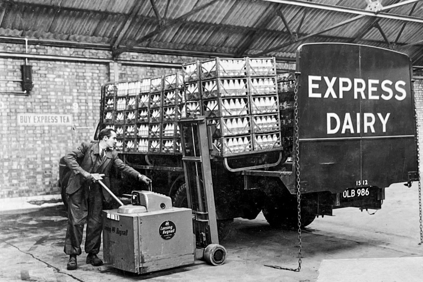 1950's Lansing Bagnall pallet stacker makes light work of this fragile load at Express Dairies. Dave Fane comments "The lorry is a Bedford TA, new in 1953 and sold or scrapped in 1961"