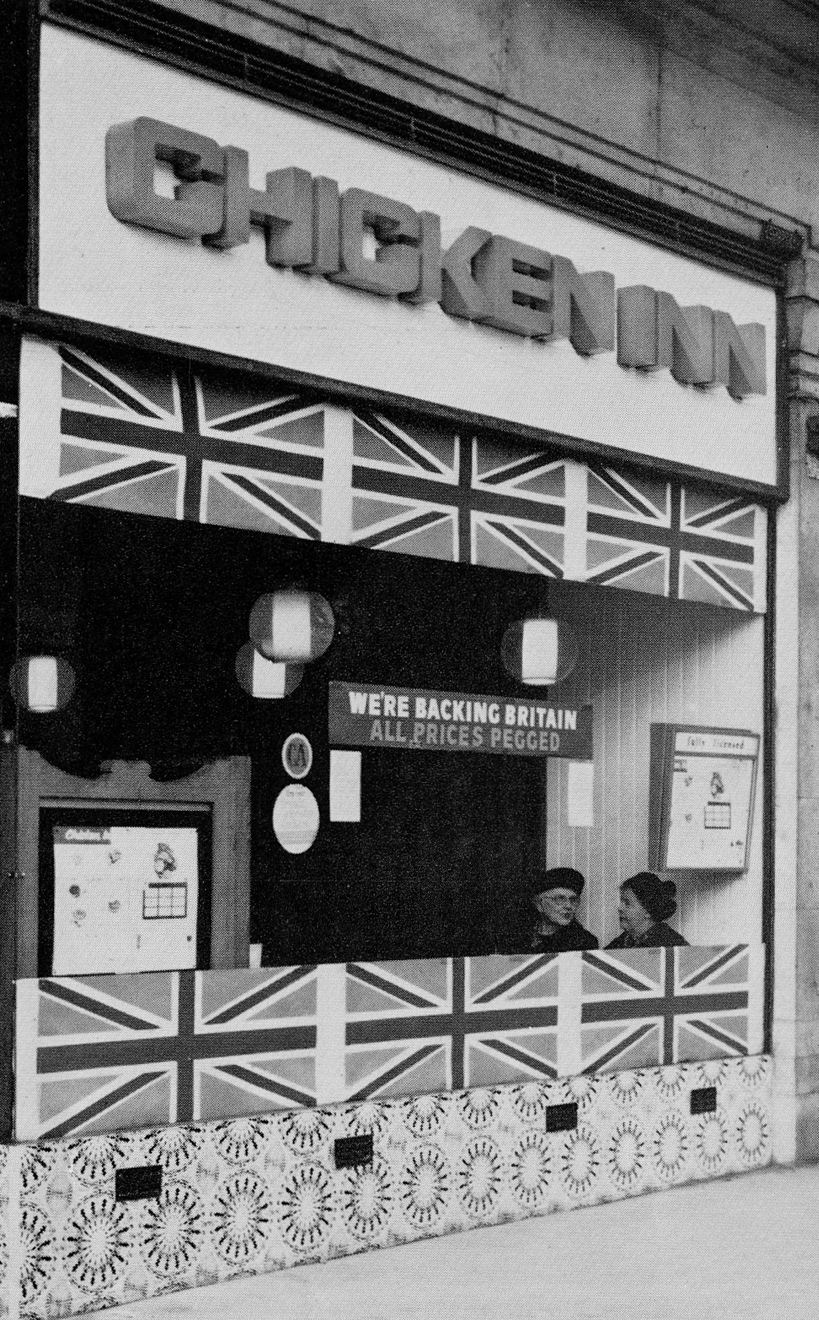 1968 Part of a 'Backing Britain' campaign, where Express pegged their prices for 6 months because of a national financial crisis. See the shop sign "Express Pegs Prices until 31st March" in the Chicken Inn window. (Express News Spring)