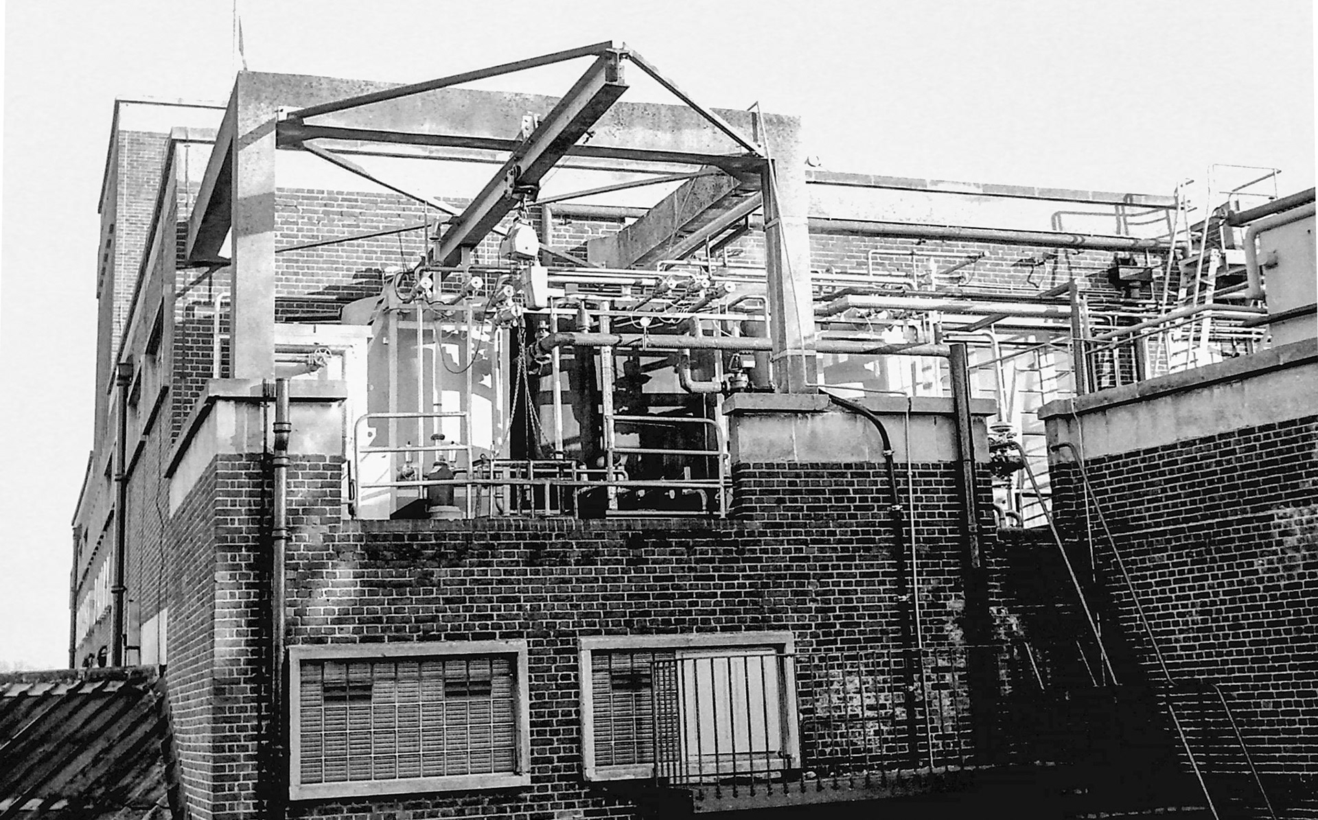 1979 Condensers and evaporators on the dairy roof at South Morden, above the ammonia compressor room. (Photographer Sam Jones)