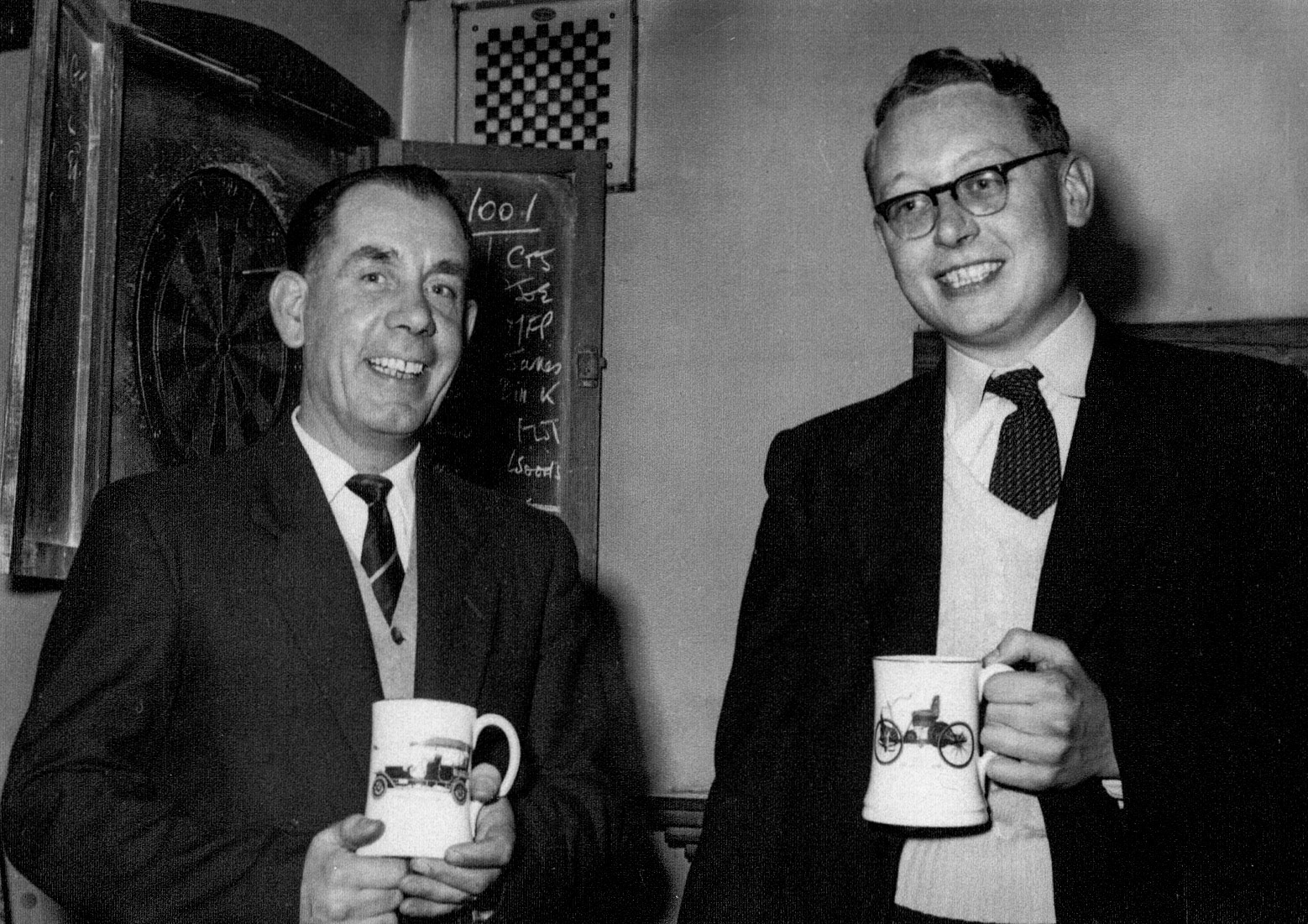 1960's? Bill Boyd, celebrating with a colleague. Phil Boyd comments "My Dad was a bottling hall foreman, he worked at Cricklewood, South Morden, College Farm, Brentford and Ruislip. We lived in Claremont road opposite the dairy". Chris Austen comments "Leo Kirkland on the right; Leo and I were colleagues in the Work Study department, headed up by Philip Saxon." (Courtesy Phil Boyd)