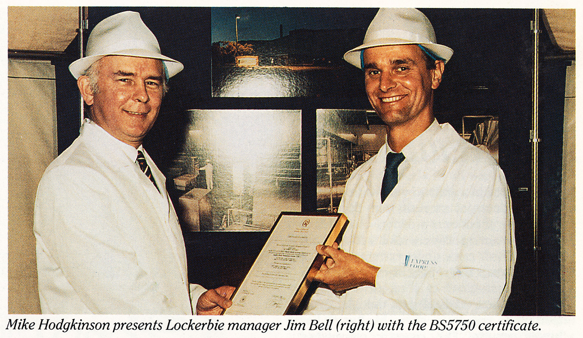 1989 Lockerbie manager Jim Bell being presented with BS5750 Certificate by MD Mike Hodgkinson