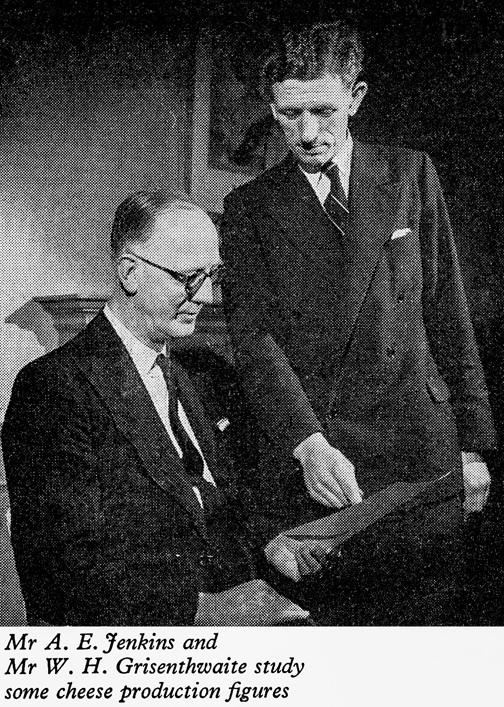 1956 picture of Mr A.E. Jenkins and Mr W.H. (Bill) Grisenthwaite, Manager and Assistant Manager of the Milk Supplies Department. (Express News April)