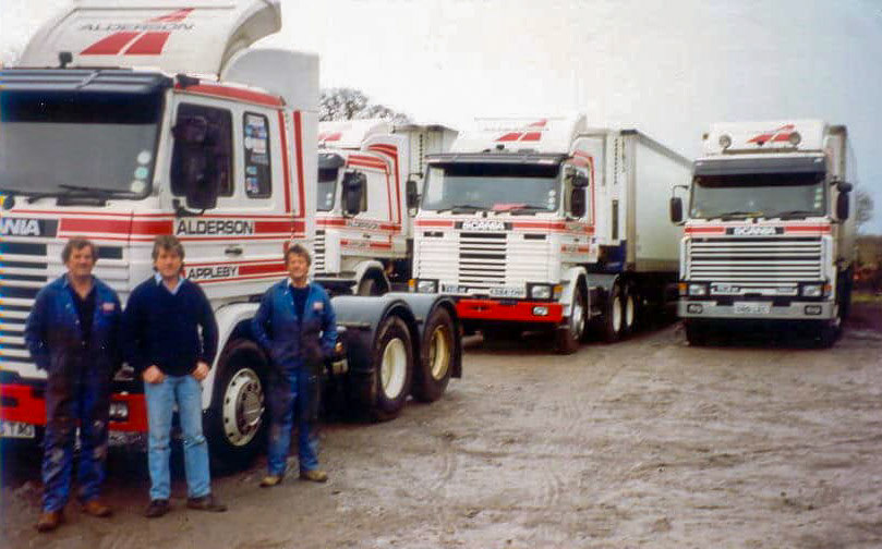 1990 Appleby. Iain Dargue comments "The late Bruce Alderson, who after leaving Express went on to join the family haulage business. Bruce is the one on right, with his older brother Colin on the left and younger brother David. I myself worked for both Express and Alderson’s."