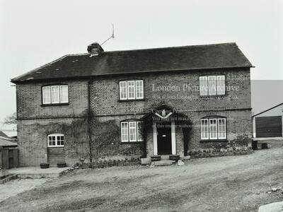1976 Copse Farm, Harrow Weald. Front elevation of Copse Farm, Brookshill Drive, Harrow Weald. The farm is believed to date back to the seventeenth century and was originally used for storing and threshing grain. It was rebuilt by Charles Blackwell of the Crosse and Blackwell Food Company. From 1939 the site became the home of Suzanne's Riding School, which closed in 2004. (Courtesy London Picture Archive)