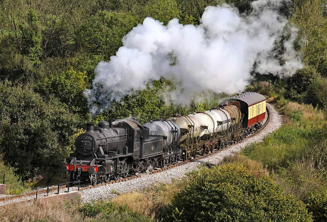 2024 Recreation of milk train on the East Somerset Railway. Tom Bailey comments "A scene that hasn't been seen for many years since steam finished in 1964 was recreated last week. This project started as just a discussion and then it became reality. Here we see a steam hauled milk tank being recreated at the East Somerset Railway." (Courtesy Tom Bailey, photo copyright David Kitching)
