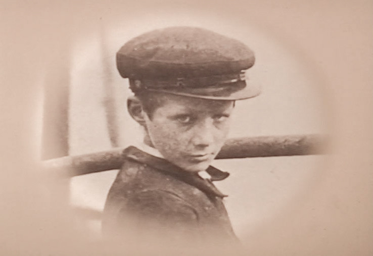 1872 George Barham's son Titus, aged 12, started supplying buns in his father's shope. (Express 125 Years video still)