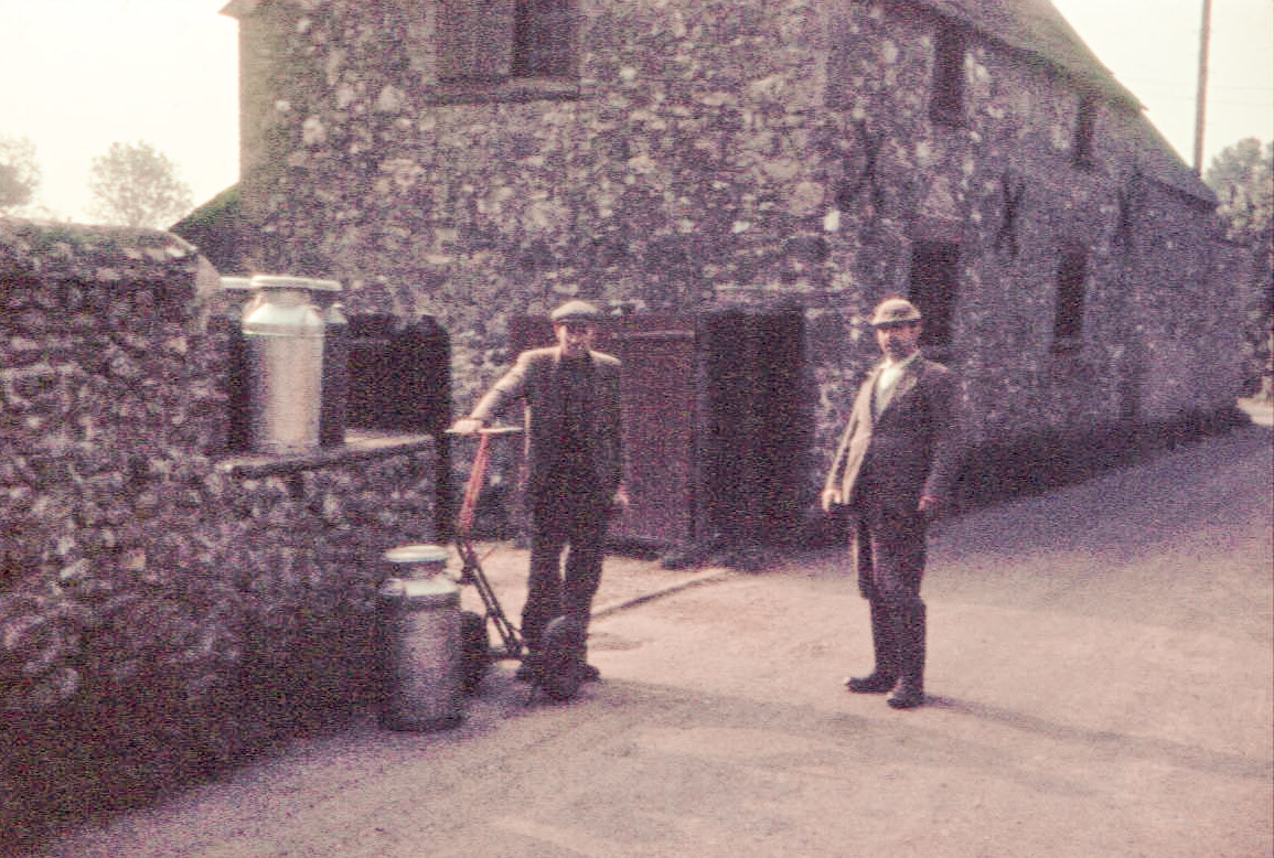 1950's Parrocks Farm, School Lane, Tatsworth, Chard. Jeremy Quick comments "The two gentlemen are Heber Quick (my grandfather) in the middle of the road and Art (Burgess) leaning on the milk churn trolley. Heber farmed there until his death in 1966 when my father Gerald Quick took it over. It was sold in 1990 on his death." (Courtesy  Jeremy Quick)