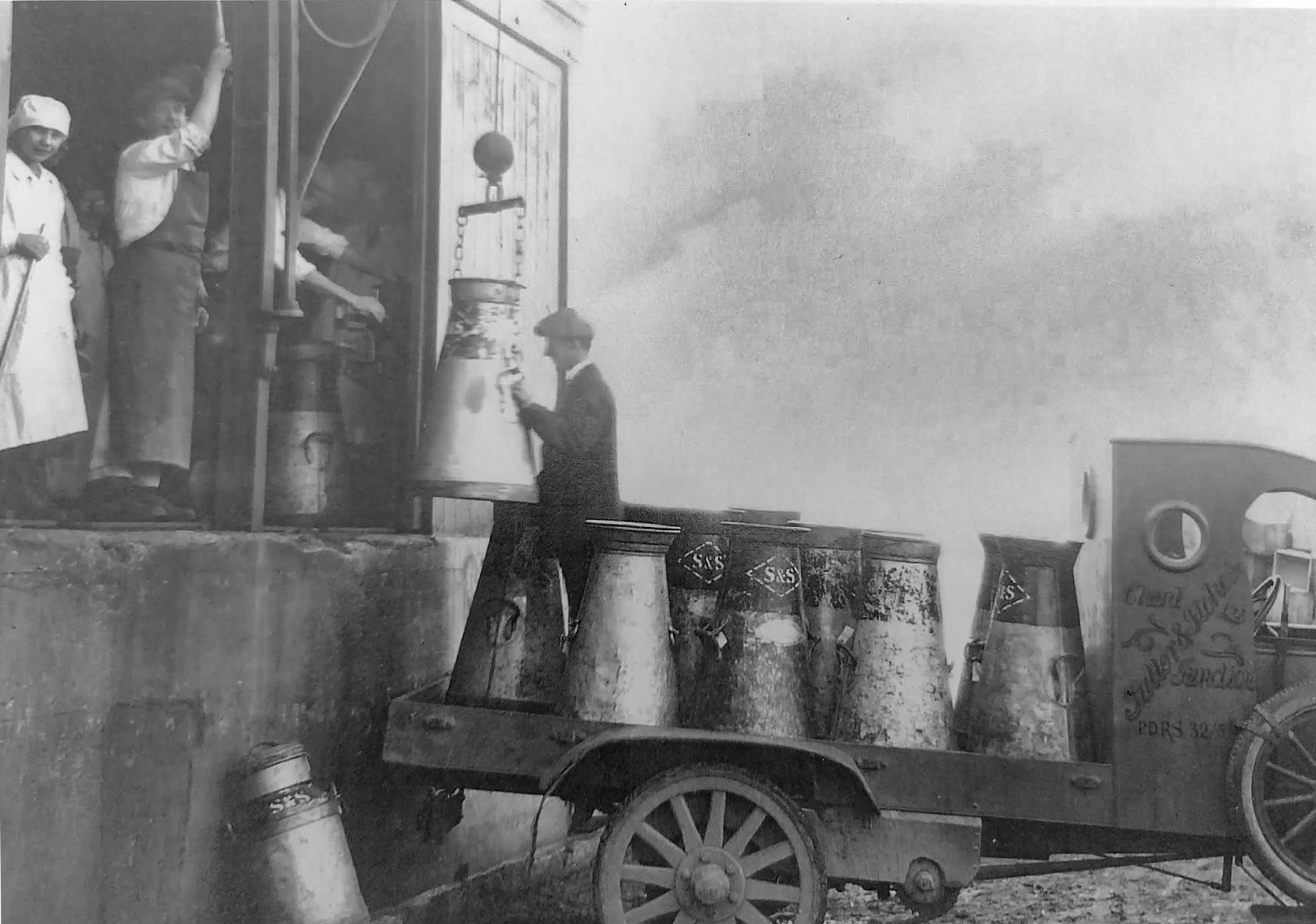 1930s? Chard Junction-unloading churns at the old factory. (Courtesy John Woodley, Chard History Group)