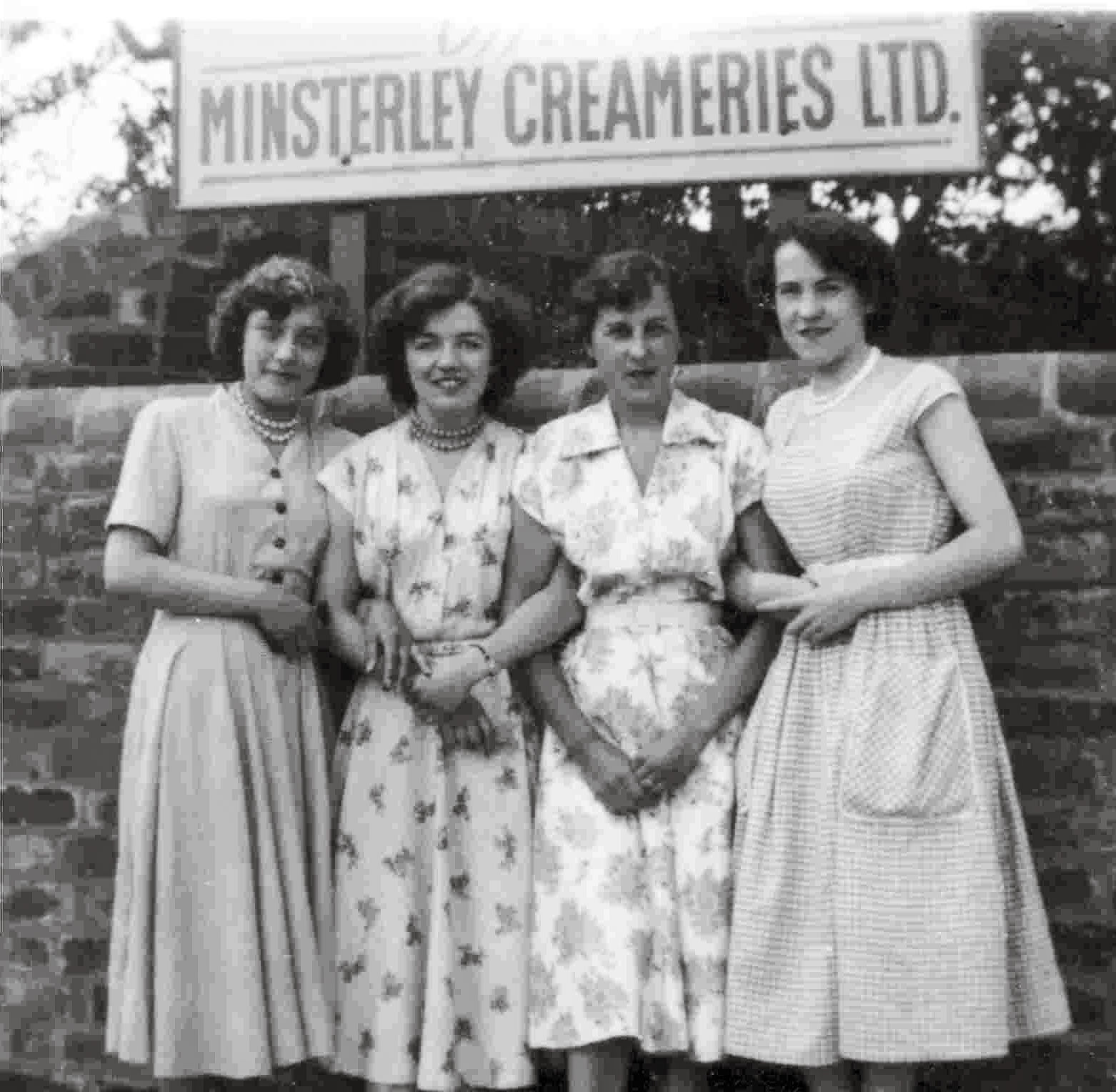 1959 Minsterley office girls. Lynn Fickenscher identifies "From left: Sandra Evans (Nee Preston) Mary Middle, Jean Gittins, Eileen Crowther. They are lovely dresses-Ladies had the waist lines to carry them off then too!-Mum had a 23" waist when she got married. I'm not sure I ever had one of those!" Janet Zakovics comments "Spent many happy teenage years at the Preston's house, Sandra still as lovely as ever." (Courtesy Lynn Fickenscher, Pontesbury past and present FB Group)