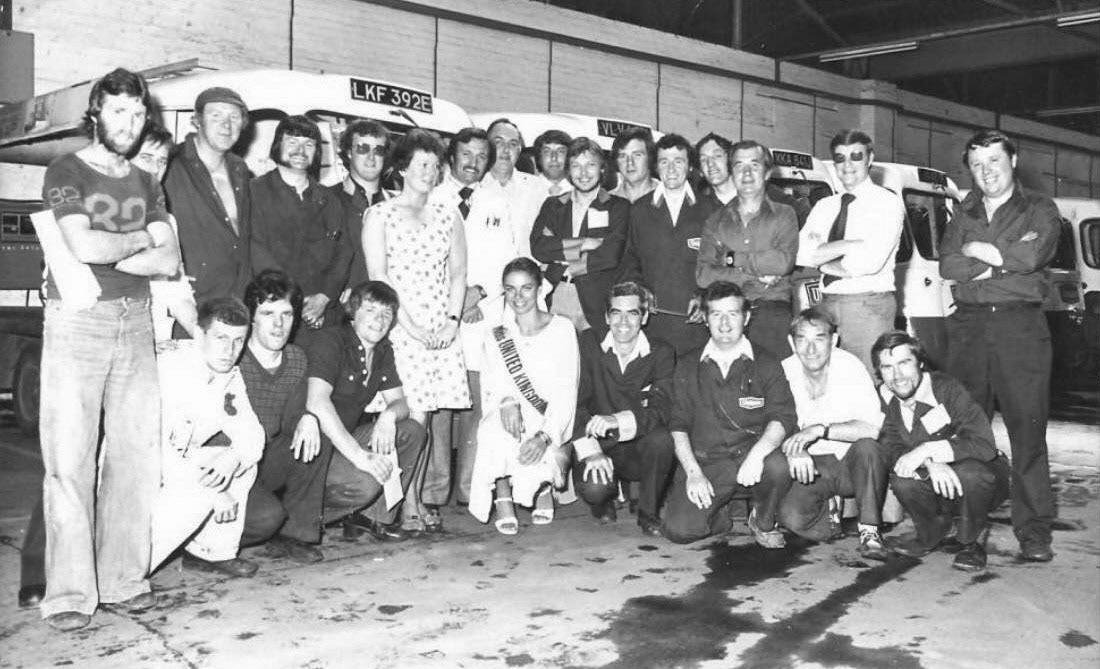 1970's? Wigan depot, Manly Street when it was Unigate-with a visit from Miss United Kingdom. Paul Simm comments "...before Waterford's swopped it with Express, for St Helens depot." Jack Houghton comments "'Twinny' second right kneeling down, front row. R.I.P. Paul Simm adds "I used to work with him at Waterford Dairies. And Ralf died as well, as did Billy." Jack Houghton "I worked with Billy Grimes at Colin Jackson's. Before I went working for Rigby's, then Waterford'S bought Rigby's and Daisy Dairy. We all got out into Daisy Dairy depot... not sure if Jon Talbot is on that photo? I left Waterford's and went to Express St Helens depot-Jon was my manager. I worked at Manley street with Ralph, Twinny and Sid. I used to drive the truck with school and shop deliveries. Stan Cottier (or Collier?) was manager, nice chap. I left shortly after going to Waterford's."